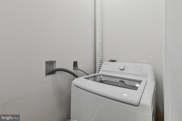 laundry area with washer / dryer