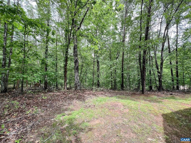 view of landscape with a view of trees
