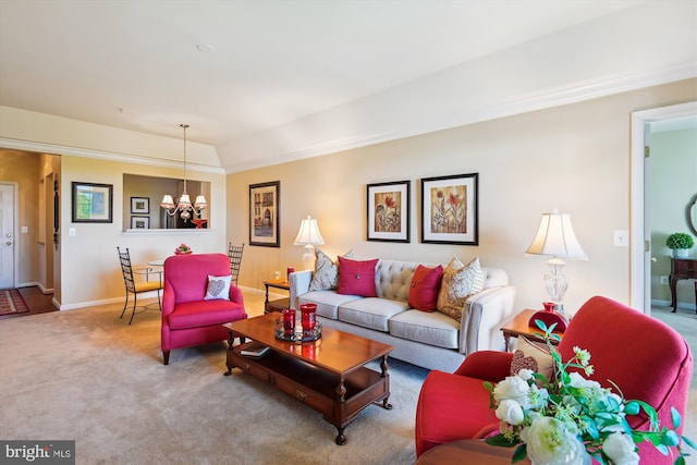 carpeted living room with a chandelier and baseboards