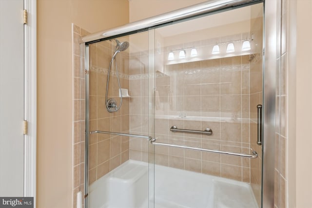 full bathroom with a stall shower