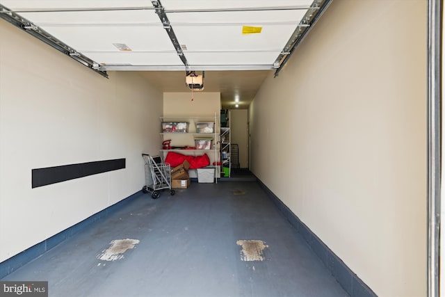 garage featuring a garage door opener