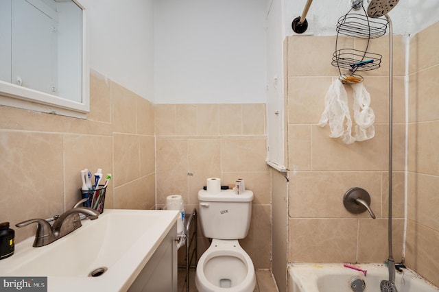 full bath with tile walls, toilet, a shower, vanity, and a bath