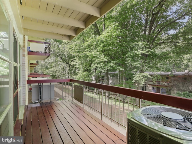 deck featuring central air condition unit