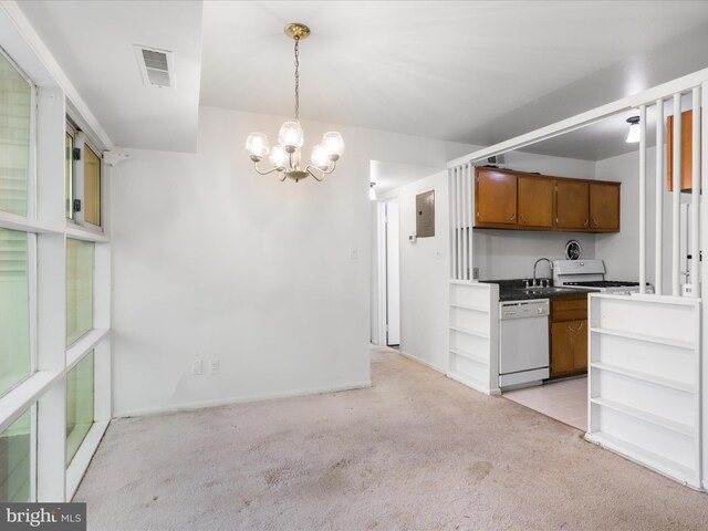 kitchen featuring white appliances, light carpet, brown cabinetry, a chandelier, and a sink