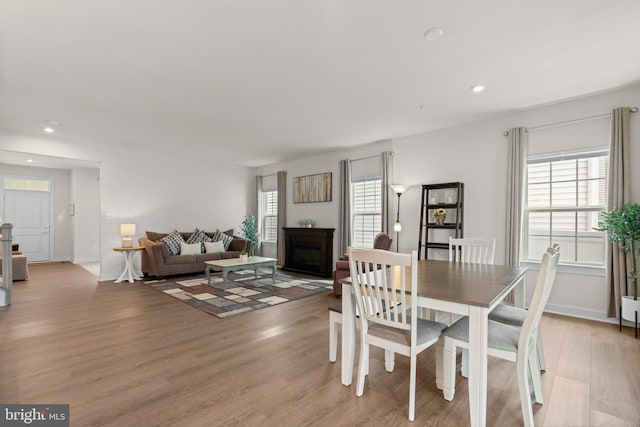 3150 Dodder Way, Odenton, MD 21113 - dining room featuring light wood finished floors, recessed lighting, baseboards, and a fireplace