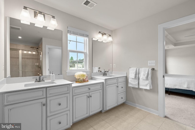 3150 Dodder Way, Odenton, MD 21113 - full bath with double vanity, a shower stall, baseboards, ensuite bath, and tile patterned flooring