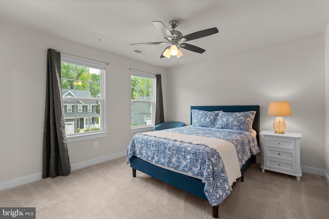 3150 Dodder Way, Odenton, MD 21113 - bedroom featuring light colored carpet, baseboards, and a ceiling fan