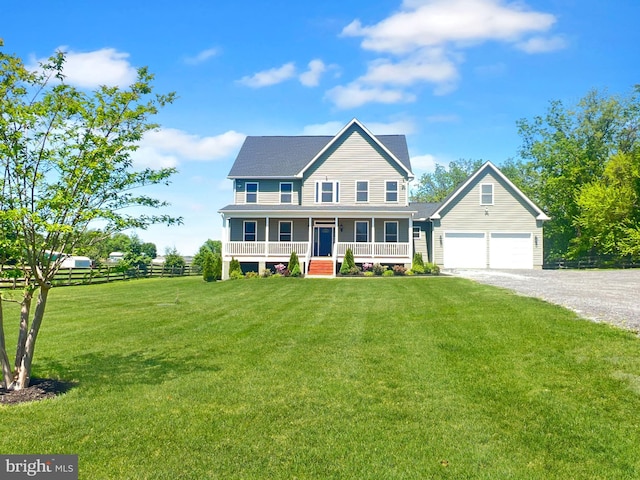 77 Iris Way, Charles Town, WV 25414 - view of front facade with covered porch, gravel driveway, and a garage