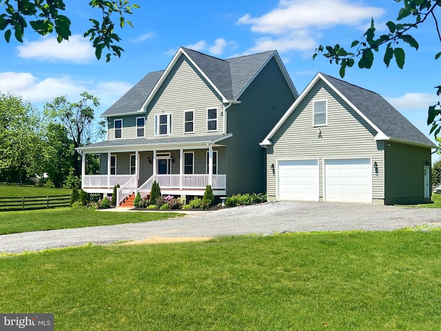 77 Iris Way, Charles Town, WV 25414 - view of front of home featuring covered porch, gravel driveway, a garage, and roof with shingles