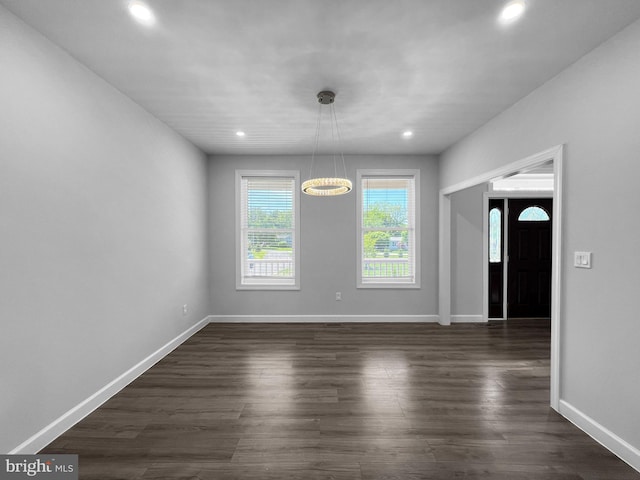 77 Iris Way, Charles Town, WV 25414 - unfurnished dining area featuring recessed lighting, dark wood-style floors, and baseboards