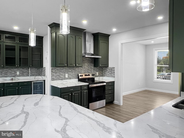 77 Iris Way, Charles Town, WV 25414 - kitchen featuring stainless steel electric range, wall chimney exhaust hood, beverage cooler, decorative backsplash, and light stone counters