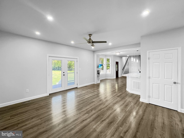 77 Iris Way, Charles Town, WV 25414 - unfurnished living room with stairway, a ceiling fan, dark wood-type flooring, baseboards, and recessed lighting