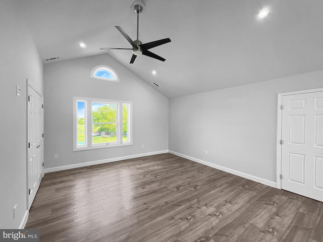 77 Iris Way, Charles Town, WV 25414 - unfurnished living room with a ceiling fan, vaulted ceiling, wood finished floors, baseboards, and recessed lighting