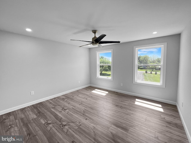 77 Iris Way, Charles Town, WV 25414 - unfurnished room featuring wood finished floors, baseboards, and recessed lighting