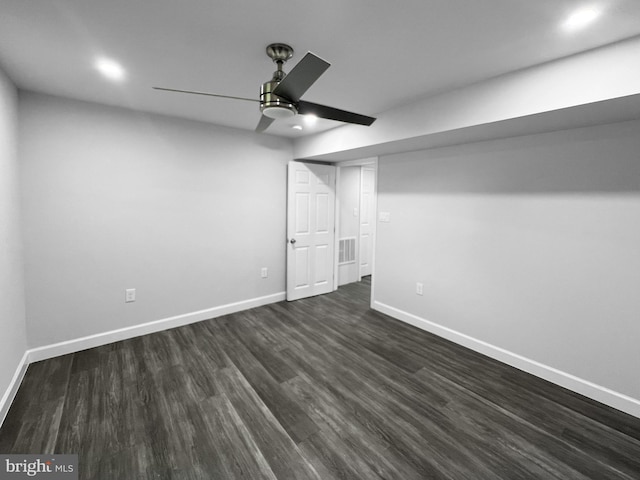 77 Iris Way, Charles Town, WV 25414 - finished below grade area featuring dark wood-style floors, ceiling fan, and baseboards