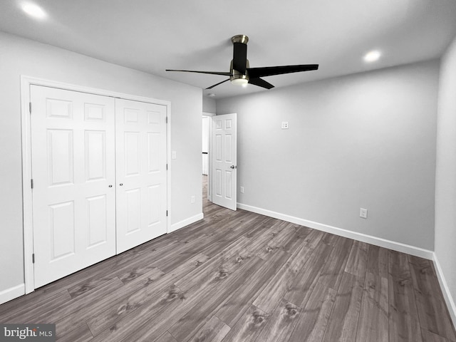 77 Iris Way, Charles Town, WV 25414 - unfurnished bedroom featuring wood finished floors, baseboards, a closet, recessed lighting, and a ceiling fan