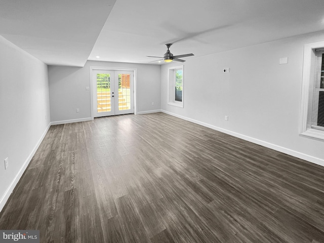 77 Iris Way, Charles Town, WV 25414 - unfurnished living room featuring ceiling fan, baseboards, french doors, and dark wood finished floors