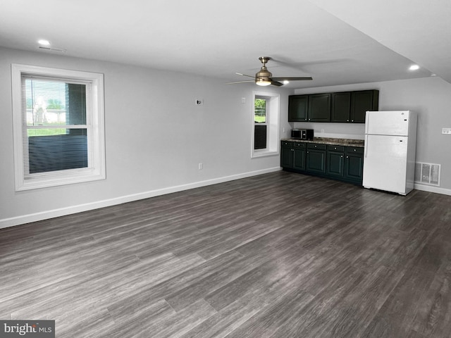77 Iris Way, Charles Town, WV 25414 - unfurnished living room featuring a ceiling fan, baseboards, dark wood-style flooring, and recessed lighting