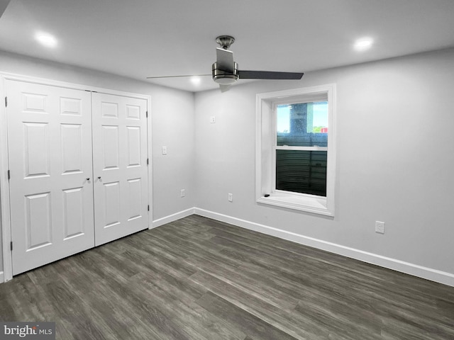 77 Iris Way, Charles Town, WV 25414 - unfurnished bedroom with dark wood-style flooring, baseboards, recessed lighting, a ceiling fan, and a closet