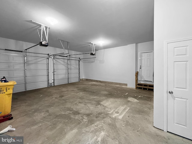 77 Iris Way, Charles Town, WV 25414 - garage featuring a garage door opener