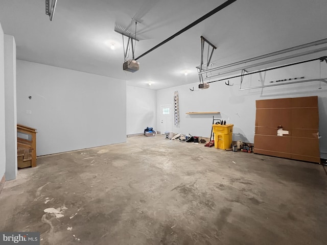 77 Iris Way, Charles Town, WV 25414 - garage featuring a garage door opener