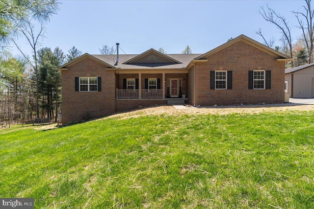 ranch-style home featuring a front yard, a porch, and brick siding