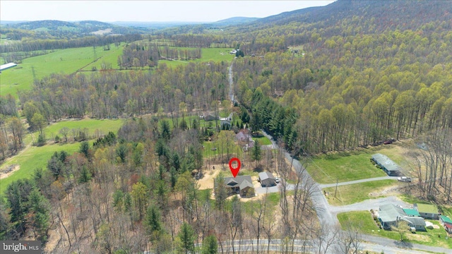 aerial view featuring a forest view