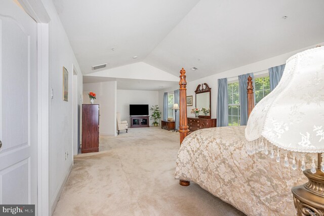 12216 Hillantrae Dr, Clinton, MD 20735 - carpeted bedroom featuring vaulted ceiling and baseboards