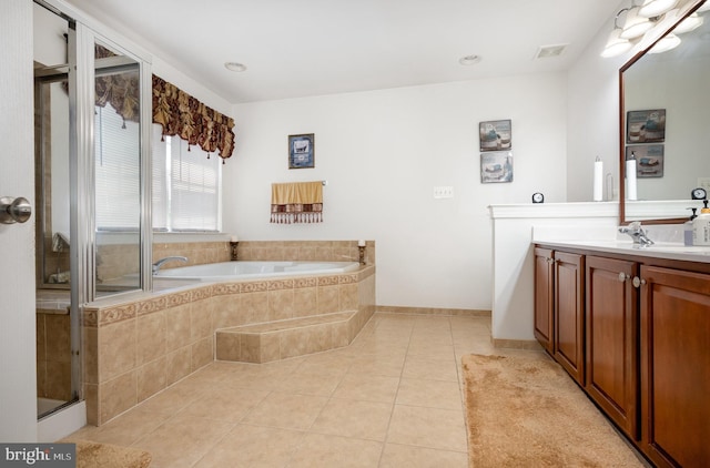 12216 Hillantrae Dr, Clinton, MD 20735 - full bathroom with vanity, tile patterned floors, a bath, and a shower with shower door