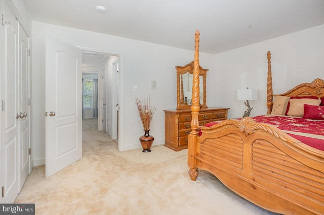 12216 Hillantrae Dr, Clinton, MD 20735 - bedroom featuring light carpet and baseboards