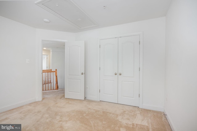 12216 Hillantrae Dr, Clinton, MD 20735 - unfurnished bedroom featuring attic access, carpet, baseboards, and a closet