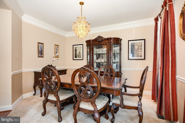 12216 Hillantrae Dr, Clinton, MD 20735 - carpeted dining space featuring crown molding, a chandelier, and baseboards
