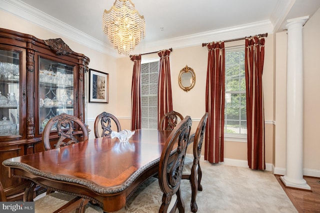 12216 Hillantrae Dr, Clinton, MD 20735 - dining space with ornate columns, a chandelier, crown molding, and baseboards