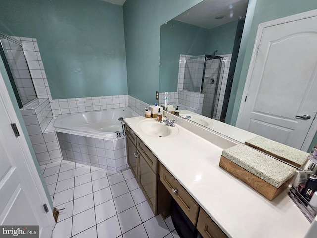 full bath featuring tile patterned flooring, a shower stall, a bath, and vanity