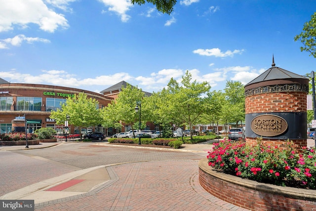 view of home's community with uncovered parking