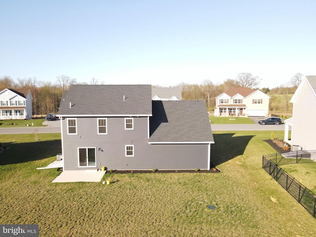 1011 Southwood Dr, Shippensburg, PA 17257 - back of house with a patio area, a shingled roof, and a residential view
