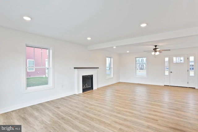 1011 Southwood Dr, Shippensburg, PA 17257 - unfurnished living room featuring light wood-style floors, a fireplace, recessed lighting, a ceiling fan, and baseboards