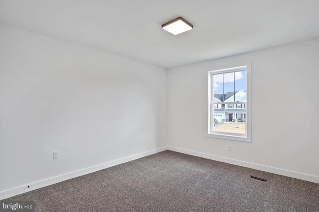 1011 Southwood Dr, Shippensburg, PA 17257 - empty room featuring dark colored carpet and baseboards