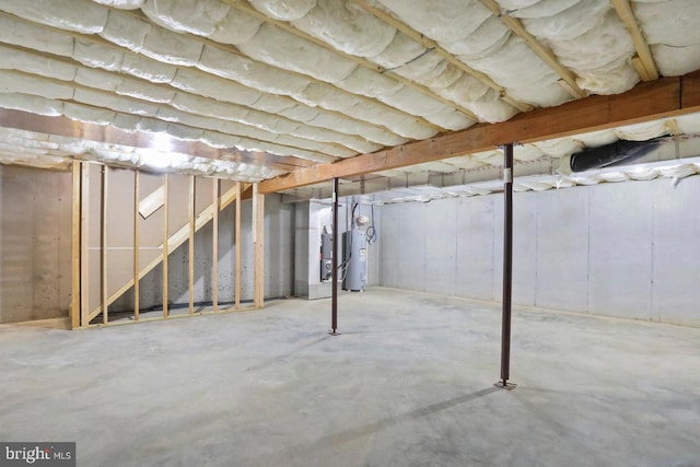 1011 Southwood Dr, Shippensburg, PA 17257 - unfinished basement with water heater and stairway