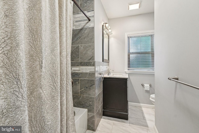 562 Washington Ave, Ewing, NJ 08628 - bathroom featuring marble look tile flooring, toilet, vanity, baseboards, and shower / bath combination with curtain