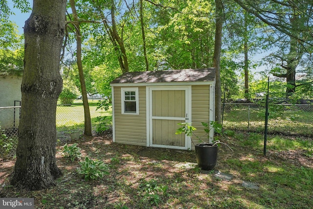 562 Washington Ave, Ewing, NJ 08628 - view of shed featuring fence