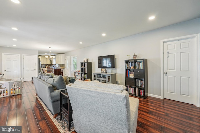 562 Washington Ave, Ewing, NJ 08628 - living room with dark wood-style floors, recessed lighting, a chandelier, and baseboards