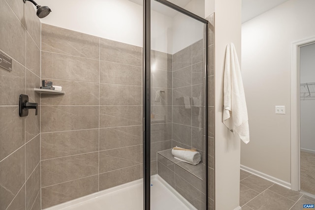 464 Bayberry Ln Unit F3C-10, Zion Crossroads, VA 22942 - full bath with baseboards, a walk in closet, and a stall shower