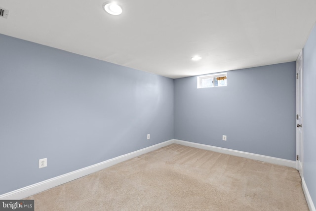 basement with recessed lighting, baseboards, visible vents, and carpet
