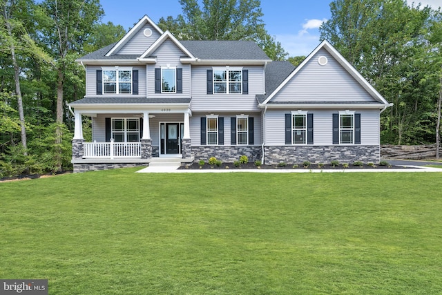 14875 Buckingham Ct, Issue, MD 20645 - craftsman-style house with a porch, a front yard, stone siding, and a shingled roof