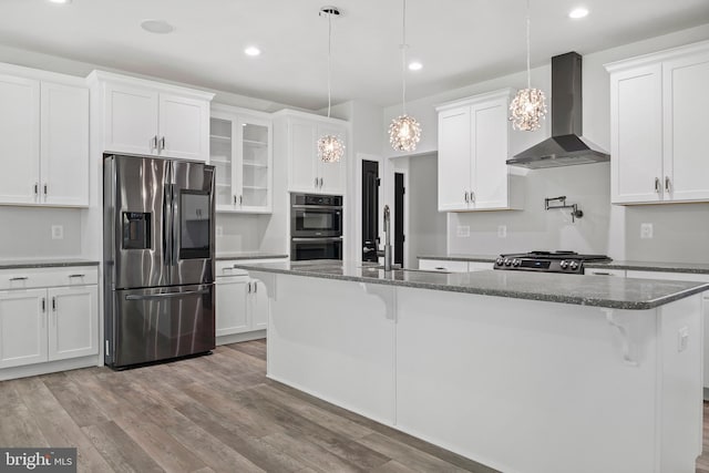 14875 Buckingham Ct, Issue, MD 20645 - kitchen with stainless steel refrigerator with ice dispenser, wall chimney range hood, a sink, an island with sink, and white cabinets