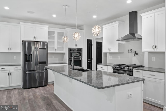 14875 Buckingham Ct, Issue, MD 20645 - kitchen with wall chimney exhaust hood, stainless steel appliances, a chandelier, white cabinetry, and recessed lighting