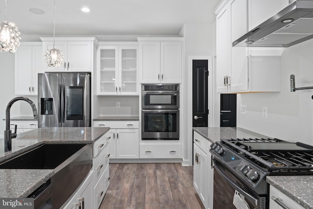 14875 Buckingham Ct, Issue, MD 20645 - kitchen featuring stainless steel appliances, wall chimney exhaust hood, white cabinets, and recessed lighting