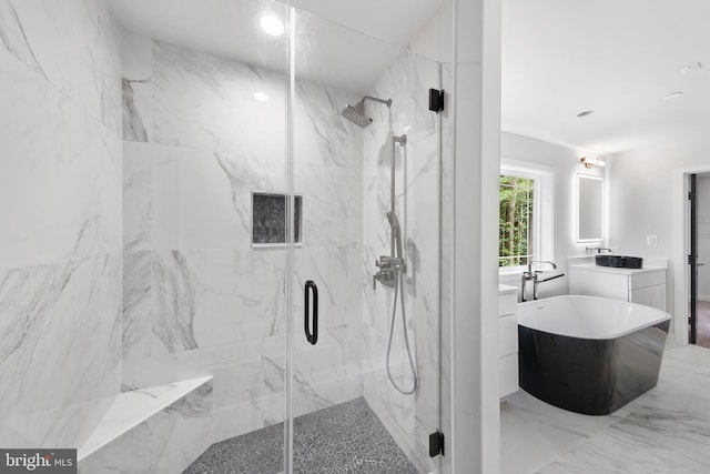 14875 Buckingham Ct, Issue, MD 20645 - bathroom with a marble finish shower, vanity, a freestanding bath, and marble finish floors