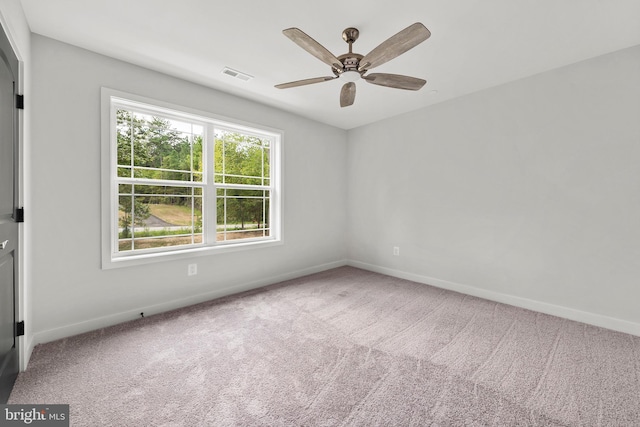 14875 Buckingham Ct, Issue, MD 20645 - carpeted empty room featuring baseboards and a ceiling fan